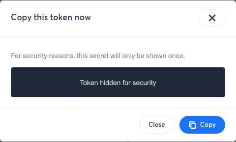 Fenêtre d’affichage unique du token avec le secret masqué par sécurité