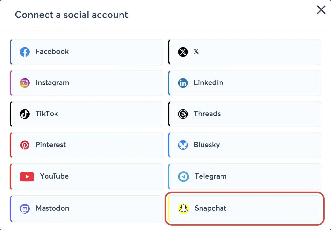 La ventana Connect a social account, con el icono de Snapchat resaltado entre las plataformas disponibles